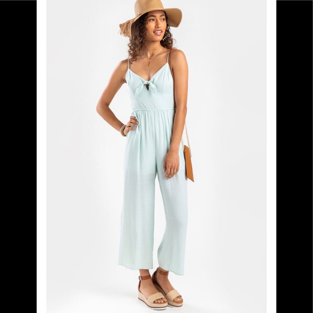 Mint green jumpsuit.